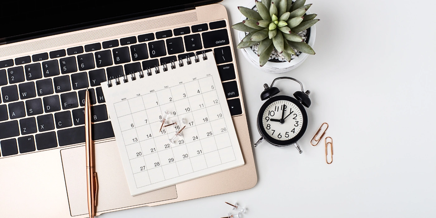 Calendar with a pen marking travel dates, symbolizing planning the best time to visit Tabin Wildlife Reserve.