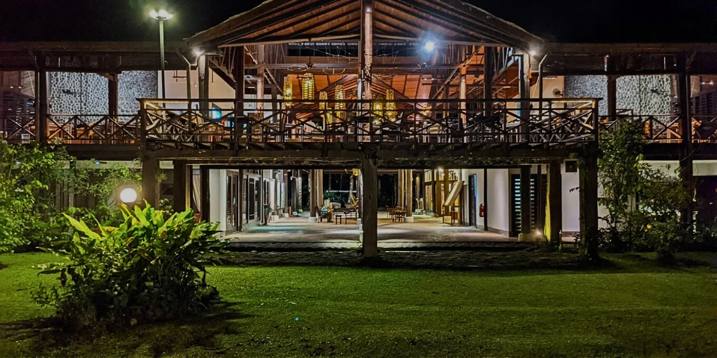 Elevated wooden chalets of Borneo Rainforest Lodge surrounded by dense rainforest in Danum Valley, Sabah