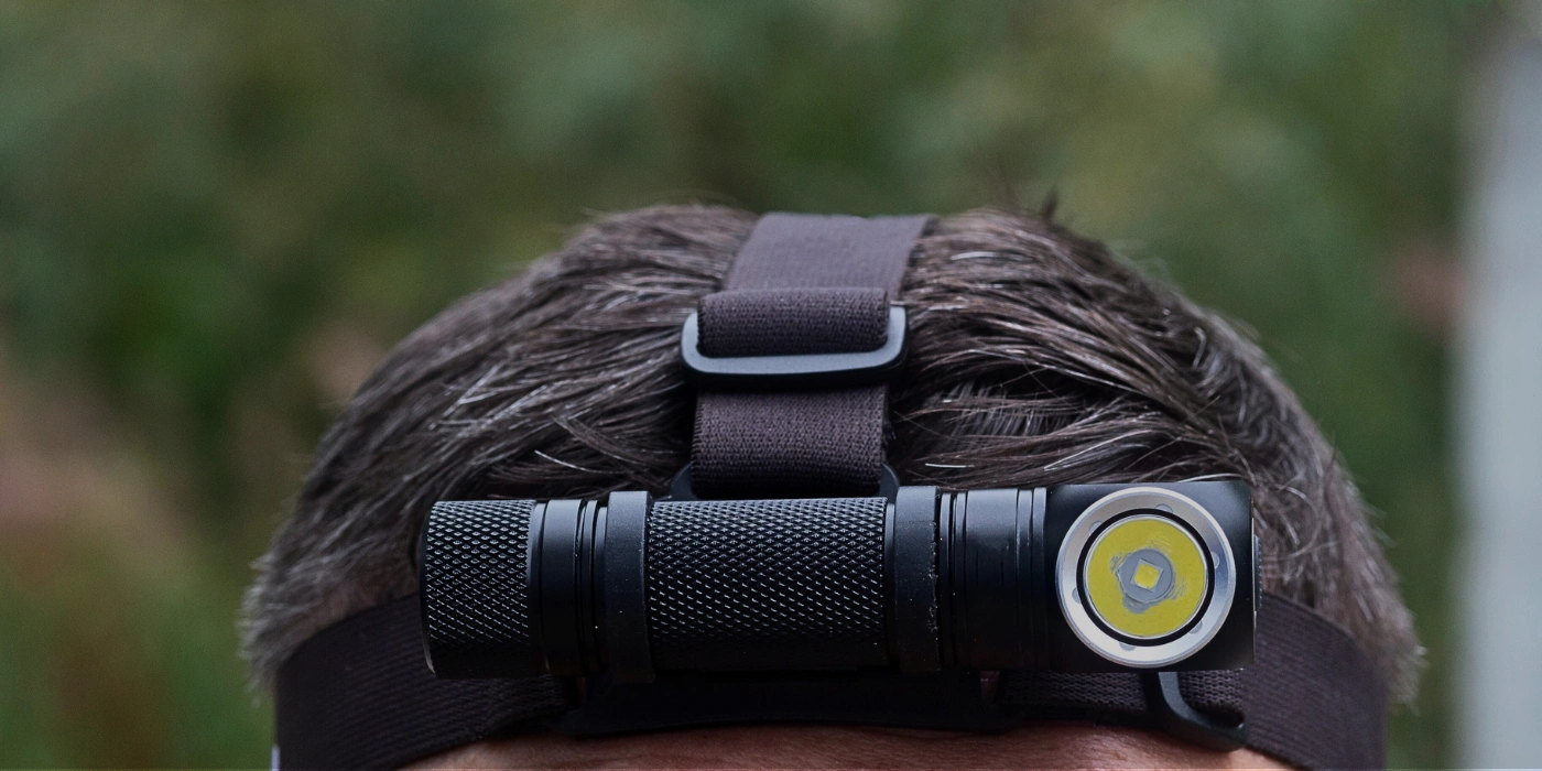 A person wearing a headlamp