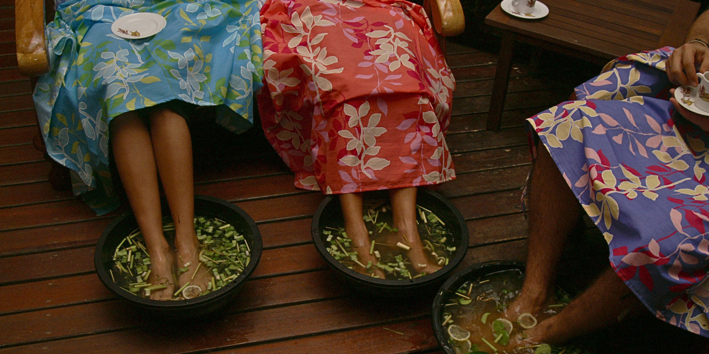 Guest enjoying a herbal foot soak session at Tabin Wildlife Resort