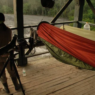 a women standing next to her sleeping bag used for an overnight stay in Tabin Mud Volcano - 4D3N Tabin Wildlife Tour and Mud Volcano Stay