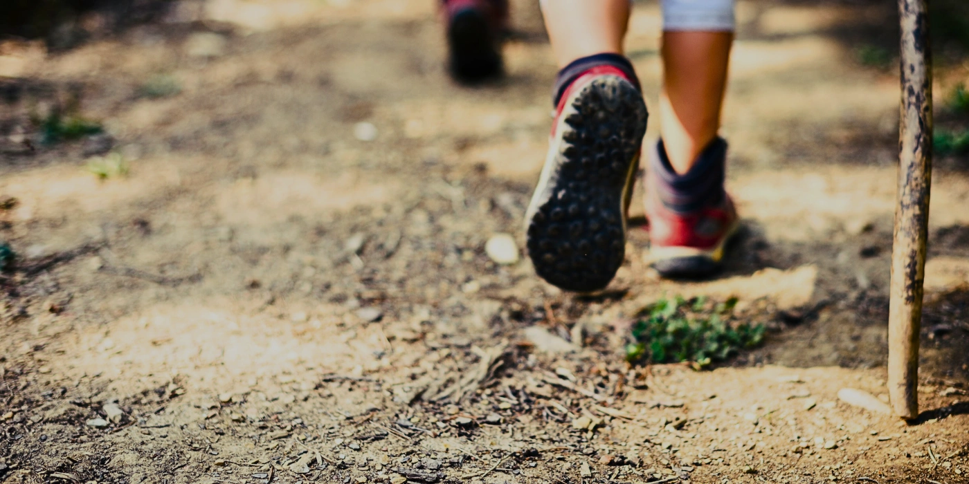 A family hiking together along Telok Pandan Kecil trail in Bako